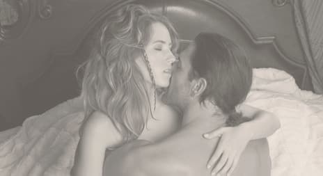 Erotisk mann og kvinne i sengen